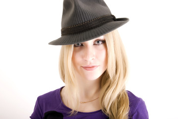 Portrait of a young blonde in hat