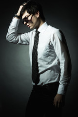 Fototapeta premium Fashion portrait of the young businessman