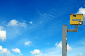 Photo of a yellow speed camera, with space for your editorial ov