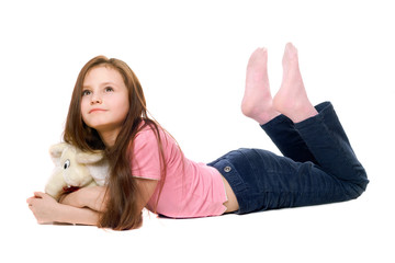 Little girl with a teddy elephant