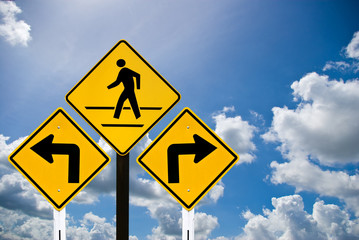 Turn sign and man walking sign