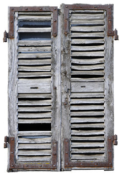 Closed window with old wood shutters on a white background