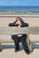 Woman relaxing at the sea.