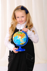 little girl with a color globe