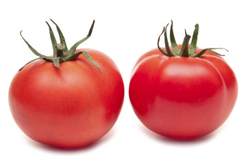 two fresh tomato isolated on white background.