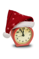 old scratched alarm clock in the hat of Santa