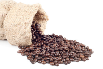 Coffee beans in canvas sack on white background