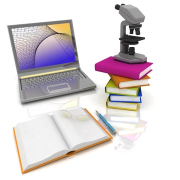 Laptop, microscope and books