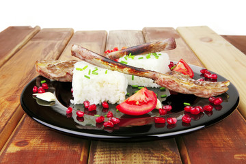 barbecued ribs served with rice