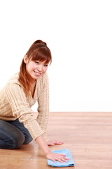 Fototapeta premium young woman wipes the floor