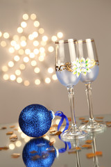 Glass of champagne on holiday background