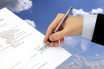 The Signature of Business Contract on the cloudy Sky