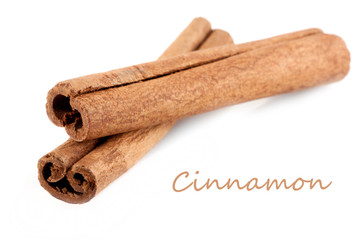 Two cinnamon sticks isolated on white background.