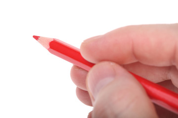 red pencil in hand