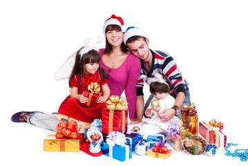 Happiness family in christmas hat isolated on white