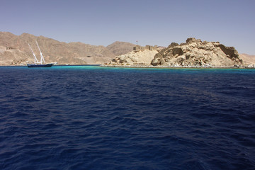 Naklejka premium island with stronghold and boat in Red Sea - Egypt, Africa