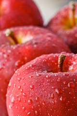 Drops of water on fresh red apples