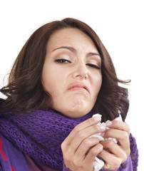 Young woman with handkerchief having  cold.