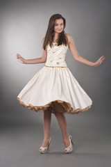 Naklejka premium pretty dancing young girl