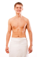 Portrait of young happy naked man isolated over white