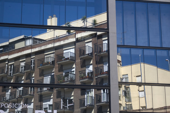 Reflection in glass facade - Neighborhood of Lavapies Madrid