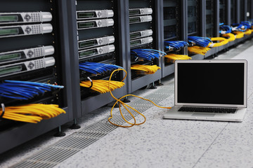 laptop computer at server network room