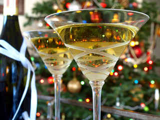 Crystal martini glasses with wine bottle on the trolley