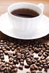 Coffee over dark roasted coffee beans