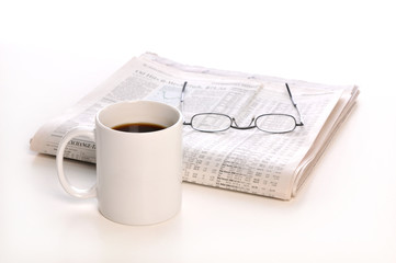 Businesspapers, cup of coffee and glasses