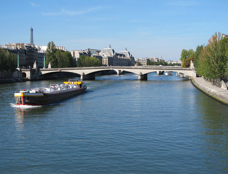 View of the Louvre Museum and Eiffel Tower at the Seine River