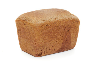 The loaf of bread is isolated on a white background