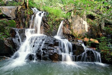 Fototapeta na wymiar Waterfall in forest
