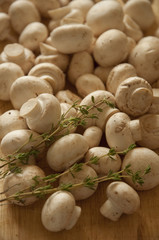 Champignons on wooden board