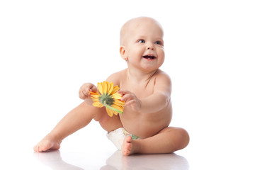 Sweet small baby with flower.