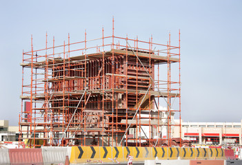 In situ casting of bridge column supported by scaffold jacks