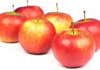 Six fresh apples on white background