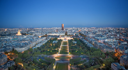 Kind to night Paris from Tour d'Eiffel, France..