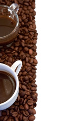 Cup of coffee and coffee beans isolated on white