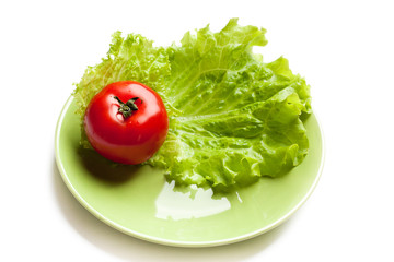 tomato and lettuce on a dish