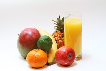 Mixed fruits with a glas of orangejuice