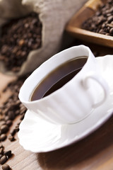 Coffee beans in a cup