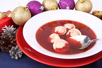 Polish Christmas Eve dish:clear borscht with dumplings (uszka)
