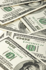 heap of old 100 dollars banknotes