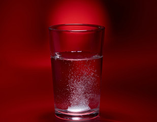 Pill in a glass