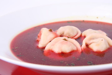 Polish Christmas Eve dish:clear borscht with dumplings (uszka)