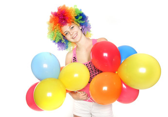 Obraz na płótnie Canvas bright studio portrait of happy young woman with balloons