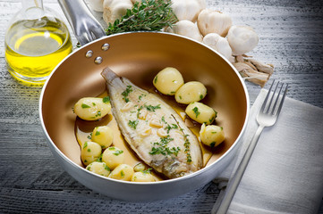 sole fish with potatoes over casserole-sogliola e patate
