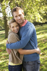 Young couple posing in park