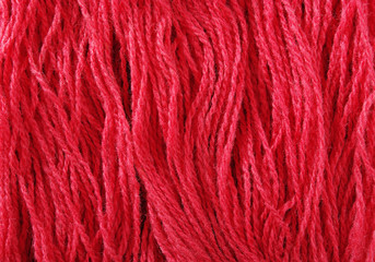 Red woollen yarn.