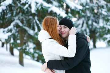 Fototapeta premium guy and the girl enjoy winter walk